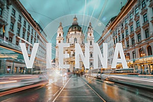 Vienna in Austria, Europe. Night scene with city name text banner.