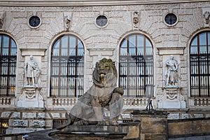 Hofburg Palace facade closeup view and lion sculpture