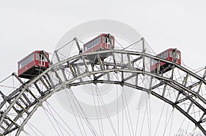 Vienna Ferris wheel with red booths for tourists.