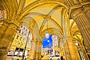 Vienna state Opera house arcades and evening street view
