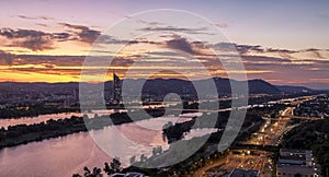 Vienna at sunset with the Danube River and the extensive public recreation area called Danube Island