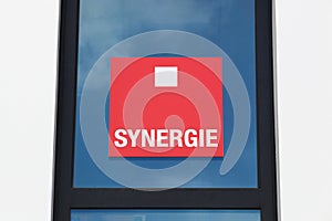 Synergie logo on a window