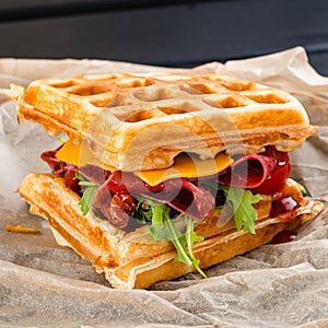 viennese waffles with ham parma and dried tomatoes