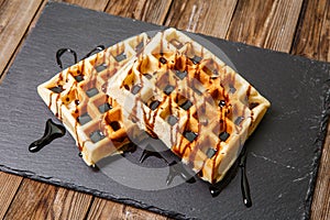 Viennese waffles watered by chocolate