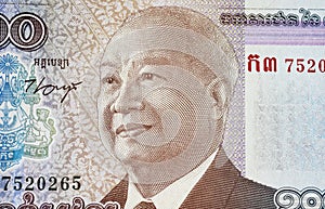Portrait of King Norodom Sihanouk on 1000 Riel Cambodia banknote currency photo