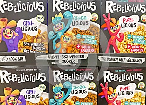 Closeup of Rebelicious vegan low sugar breakfast cereal boxes in shelf of german supermarket