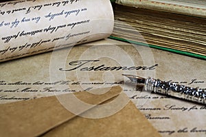 Macro closeup of retro ink pen, old vintage paper with handwritten text for last will testament