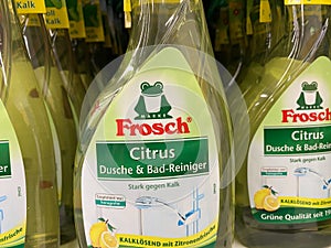 Close up of Frosch cleaning detergents bottles in shelf of german supermarket