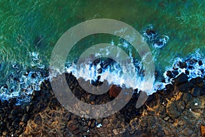 Vietnam. Coast as a background from top view. Turquoise water background from drone. Summer seascape from air.
