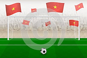 Vietnam football team fans with flags of Vietnam cheering on stadium, penalty kick concept in a soccer match