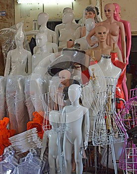 Mannequin line up Citys largest covered market, Xuan Market, Hanoi Vietnam