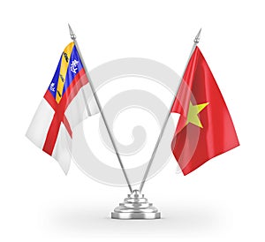 Vietnam and Herm table flags isolated on white 3D rendering