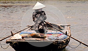 Vietnam, Hoi an: woman going to the market photo