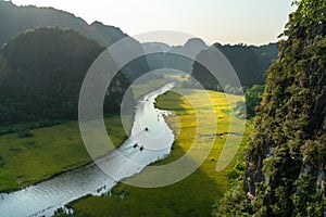 Vietnam landscape. Rice field with curve river and surrounding mountains in Tam Coc, Ninh Binh