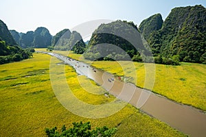 Vietnam landscape. Rice field with curve river and surrounding mountains in Tam Coc, Ninh Binh