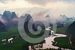 Vietnam landscape with rice field, river, mountain and low clouds in early morning in Trung Khanh, Cao Bang, Vietnam