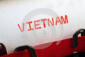 Vietnam typed on typewriter on red