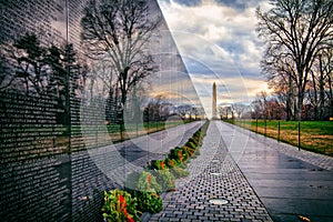 Vietnam War Memorial with Washington Monument at Sunrise, Washington, DC, USA