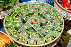 Vietnam wedding tray closeup with spousal cake labeled Song Hy photo