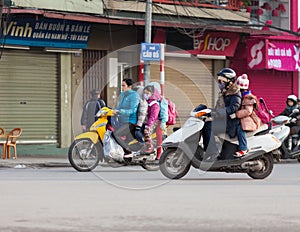 Vietnam, women on the motorbikes