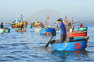 Vietnamese basket boats row at fishing village in Mui Ne