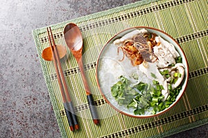 Vietnamese Chicken Glass Noodles Soup closeup on the bowl. Horizontal top view