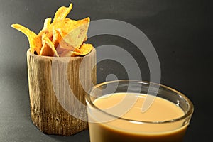 Vietnamese coffee drip on wooden planks with black background