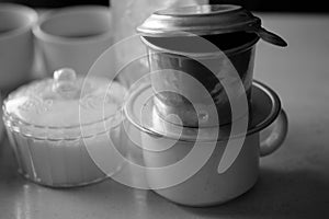 VIETNAMESE COFFEE DRIPPING IN BLACK AND WHITE EFFECT