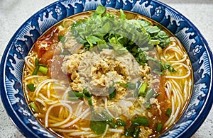 Vietnamese crab and tomato noodle soup Bun Rieu Cua photo