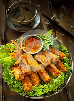 Vietnamese crispy spring rolls or Nem nuong with fish sauce and