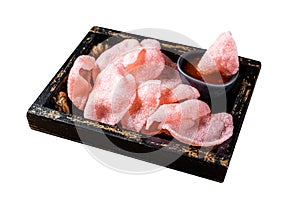 Vietnamese Crunchy kerupuk, prawn shrimp crackers, chips in a box with sauce. Isolated on white background. Top view.