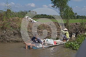 Vietnamese farmers on the Mekong River