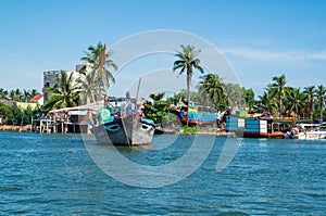 Vietnamese fishing boats on the Vin Cura Dai river near Hoi An