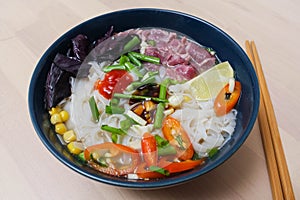 Vietnamese Fo-Bo soup with rice noodles and beef