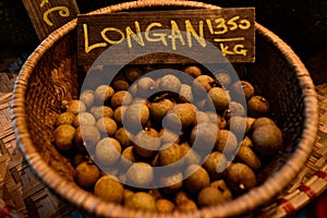 Vietnamese fruit on the market counter with a price tag