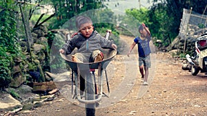Vietnamese kids playing on street in Sa Pa photo