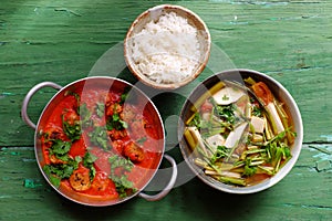 Vietnamese meal for lunch, vegetarian homemade food, tofu ball cook with tomato sauce, vegetable soup, rice bowl