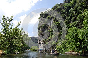 Vietnamese people and foreign traveler travel visit and amazing boat tour trip Tam Coc Bich Dong or Halong Bay on Land and Ngo