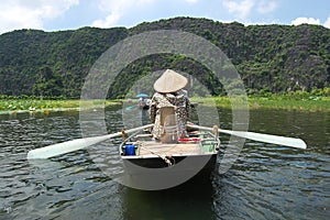 Vietnamese people and foreign traveler travel visit and amazing boat tour trip Tam Coc Bich Dong or Halong Bay on Land and Ngo