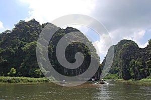 Vietnamese people and foreign traveler travel visit and amazing boat tour trip Tam Coc Bich Dong or Halong Bay on Land and Ngo