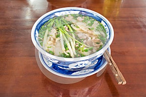 Vietnamese Rice Noodle Pho Bo Bowl and Chopsticks