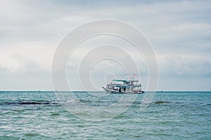 Vietnamese ship with divers and equipment for diving, ready to dive.