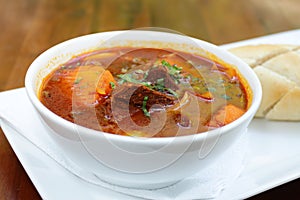 Vietnamese-Style Beef Stew Bo Kho, with bread photo