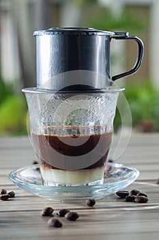 Vietnamese Style Drip Coffee with Condense Milk, Decorated with Coffee Bean