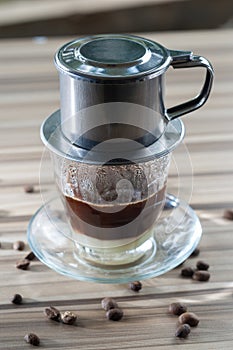 Vietnamese Style Drip Coffee with Condense Milk, Decorated with Coffee Bean