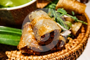 Vietnamese or Thai deep fried spring roll on a basket