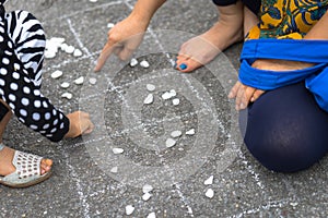 Vietnamese traditional game called O An Quan closeup