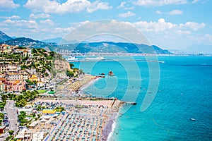 Vietri sul mare beautiful view from above to beaches with umbrellas, rocks due fratelli, blue sea and city and mountains