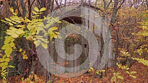 View of abandoned and closed and ruined entrance into tunnel of mine where Uranius was being mined. Lermontov city and