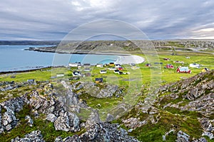 View at abandoned fishersâ€™ village Hamningberg and the shore of the Barents Sea as viewed from the fort. Finnmark, Norway